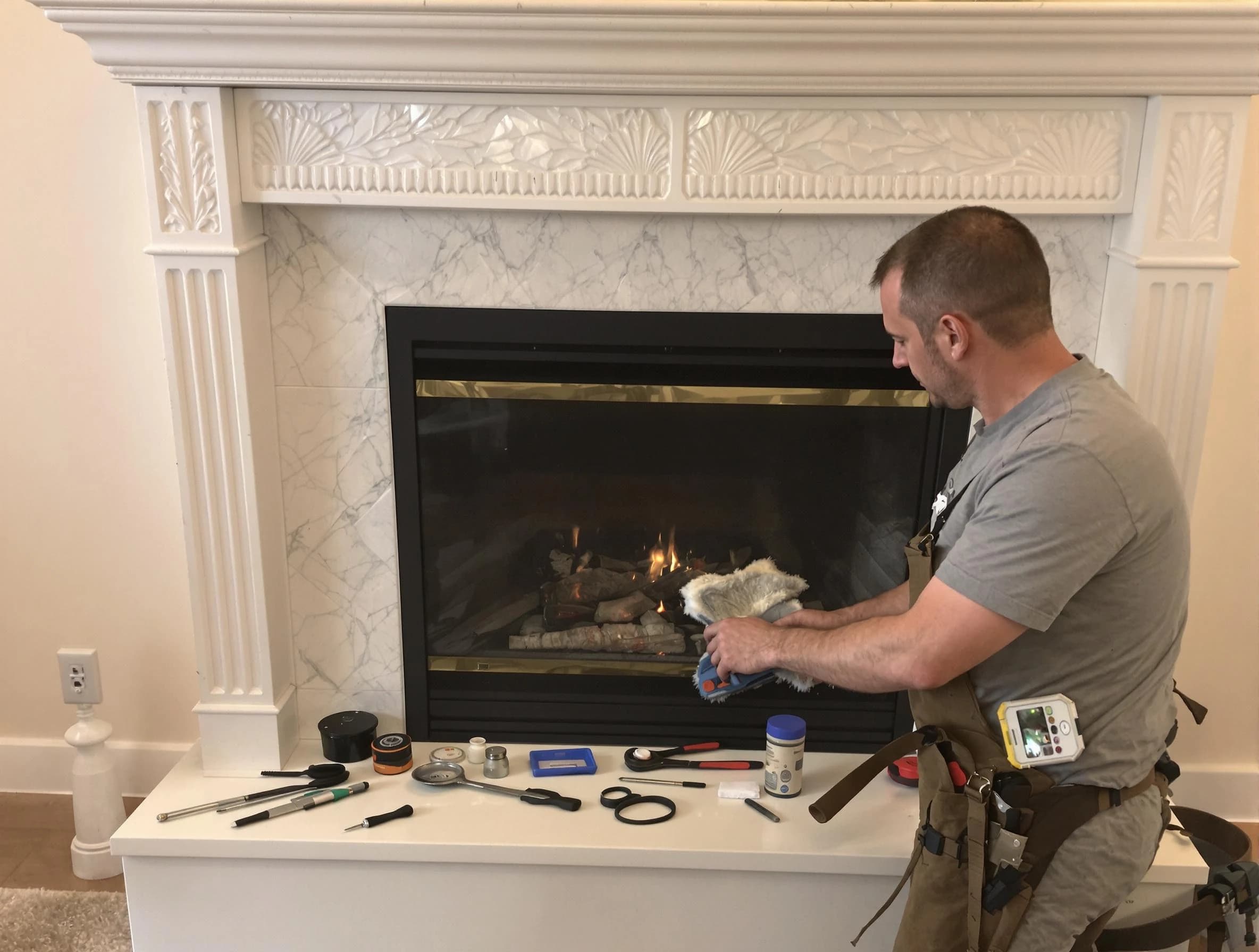 Cranberry Chimney Sweep performing fireplace maintenance in Cranberry, PA